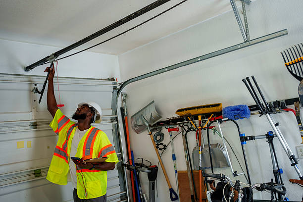 Professional Garage Door Panel Replacement technician working in Holcomb, KS